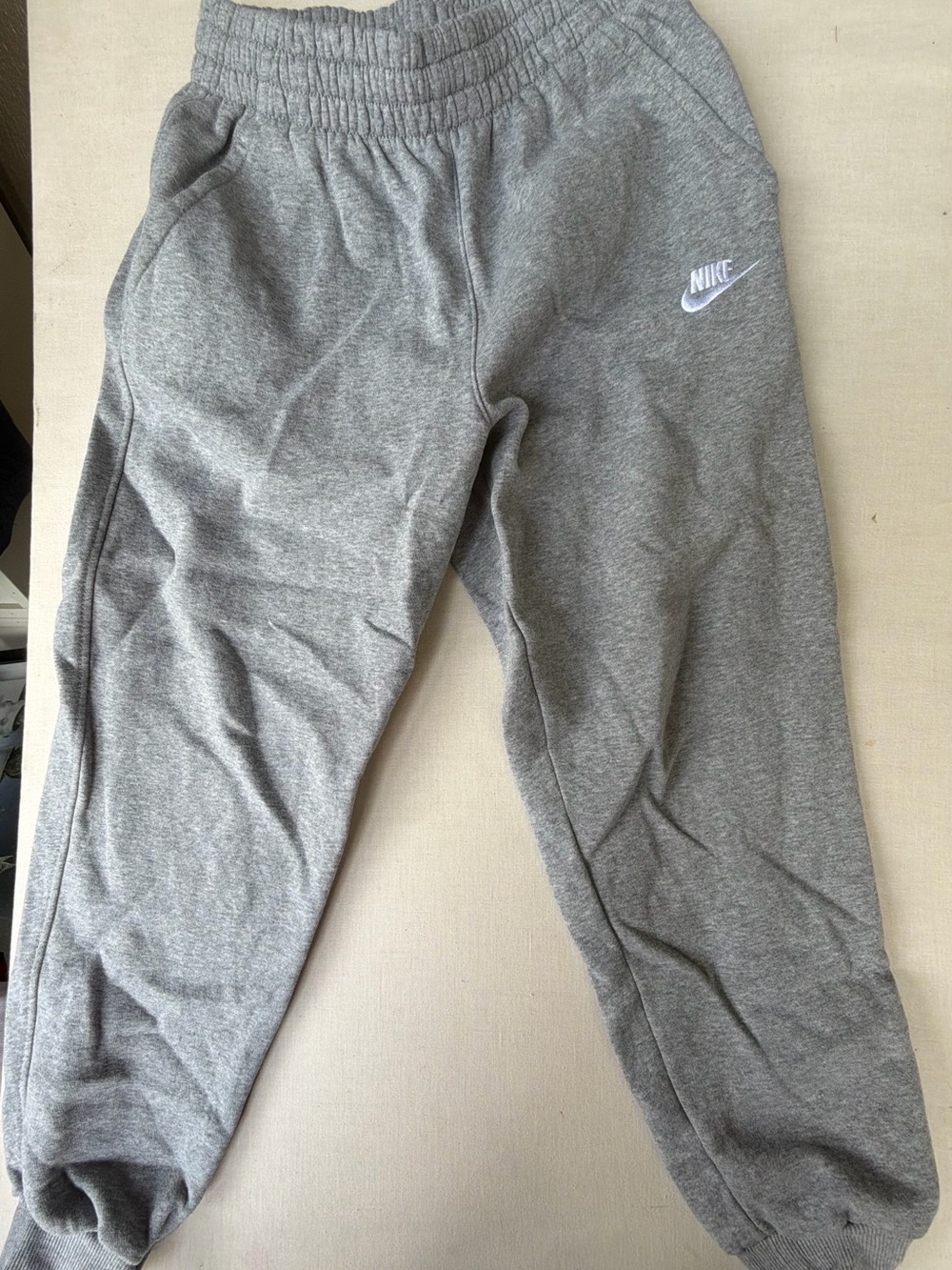 Nike Kids Gray Joggers with White Swoosh